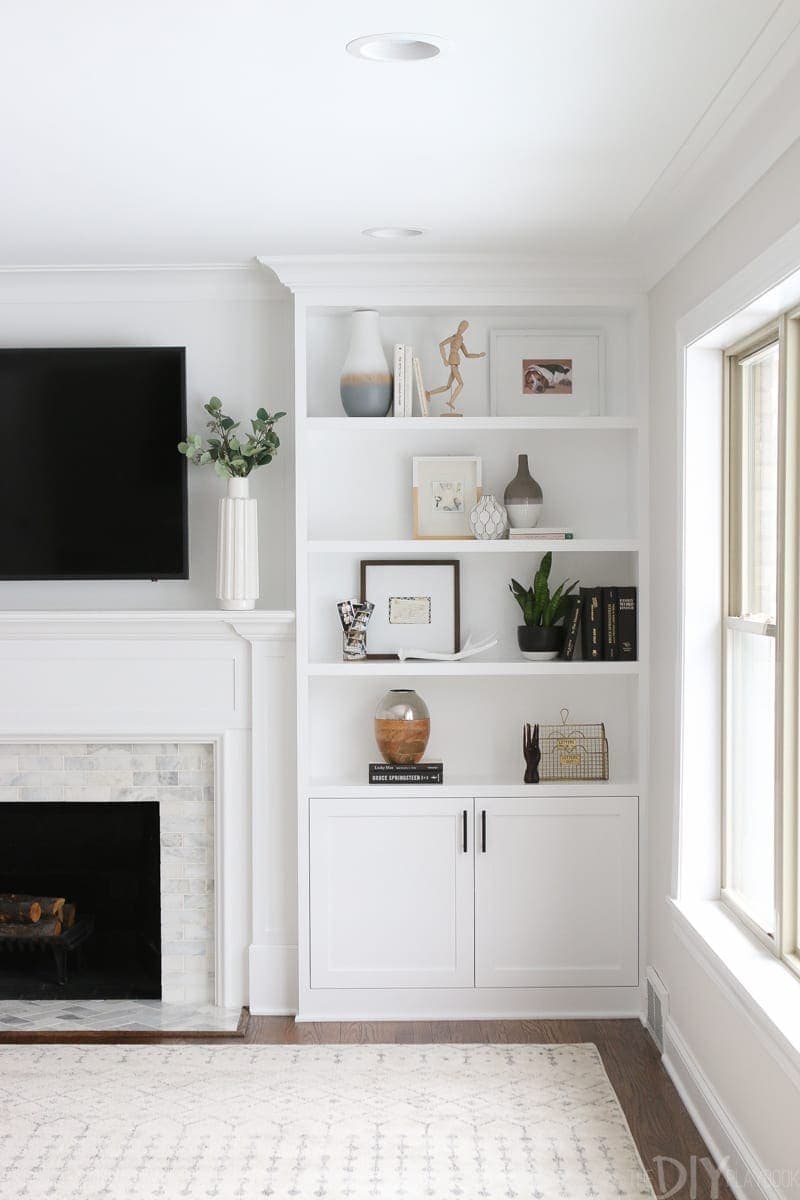 White built-ins around fireplace
