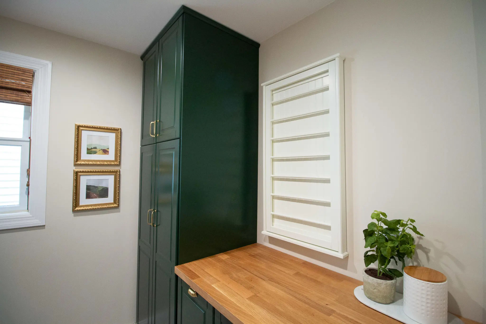 Using kitchen cabinets in a laundry room makeover