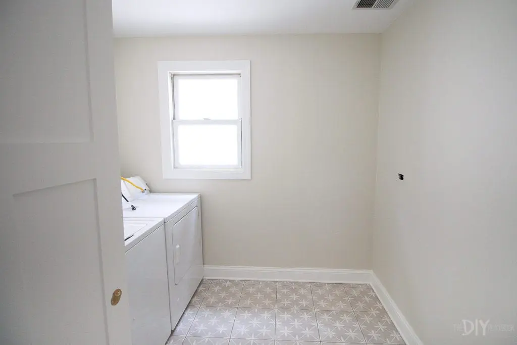 Laundry room with new floor tile